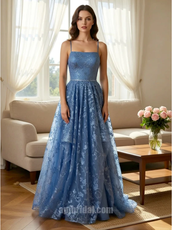 Light Blue Spaghetti Strap Lace Appliqué Layered Asymmetrical Mesh Gown捕捉静谧的色彩美学，这款礼服以浅蓝色调呈现如晨曦般的清透感。上半身覆以精美蕾丝贴花，配合极简细吊带平直领口，勾勒出优雅的肩颈轮廓。裙摆采用独特的层叠不对称网纱设计，在行进间呈现如波浪般的轻盈动态。二十年匠心工艺确保了网纱的支撑力与亲肤感，是高端舞会、婚礼伴娘或正式庆典的理想之选。