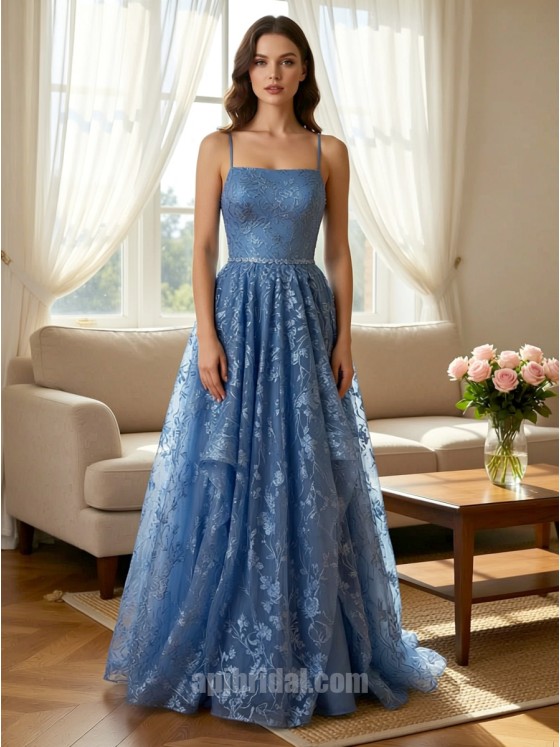 Light Blue Spaghetti Strap Lace Appliqué Layered Asymmetrical Mesh Gown捕捉静谧的色彩美学，这款礼服以浅蓝色调呈现如晨曦般的清透感。上半身覆以精美蕾丝贴花，配合极简细吊带平直领口，勾勒出优雅的肩颈轮廓。裙摆采用独特的层叠不对称网纱设计，在行进间呈现如波浪般的轻盈动态。二十年匠心工艺确保了网纱的支撑力与亲肤感，是高端舞会、婚礼伴娘或正式庆典的理想之选。