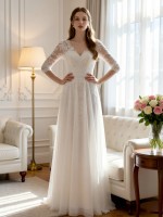 Elegant Floor-Length Wedding Dress with Lace Bodice and Ethereal Tulle Skirt